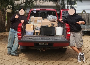 Truckload of parts in boxws, with my helpers